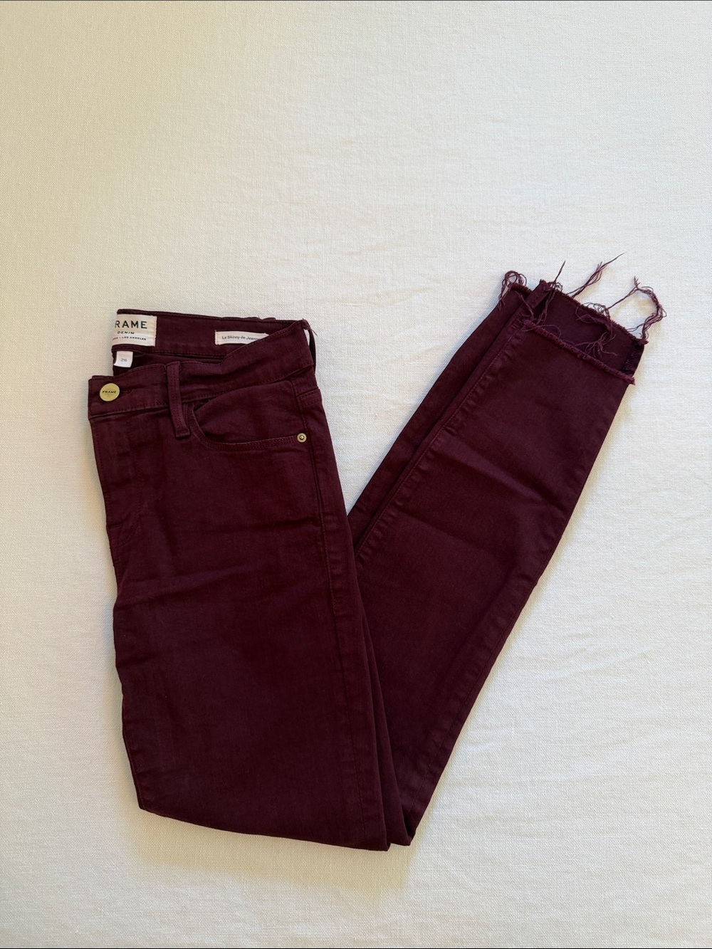 Frame Denim Burgundy Skinny Jeans with Frayed Hem